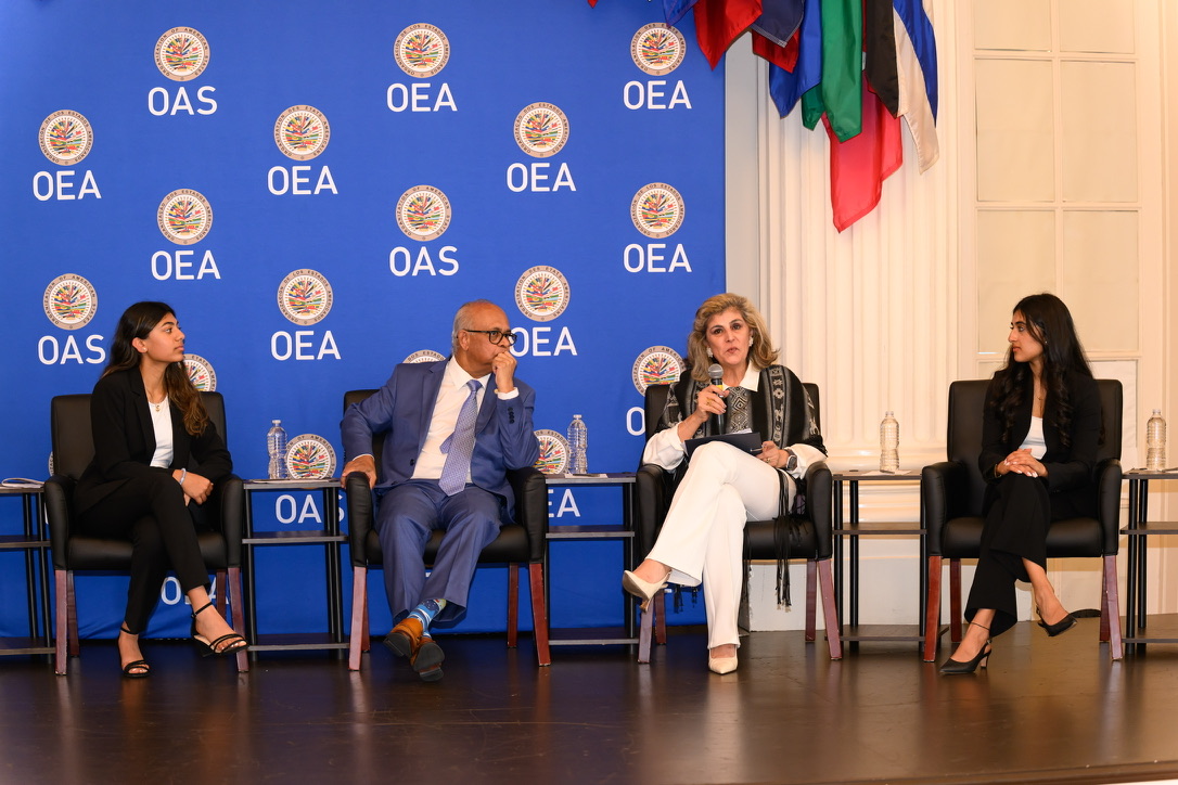 IYLC Executive Director Samaya Shah on stage with OAS Secretary General Albert Ramdin and Assistant Secretary General Laura Gil during IYLC's International Youth Day dialogue